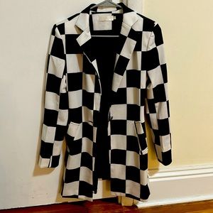 Beautiful black and white jacket great for parties or work